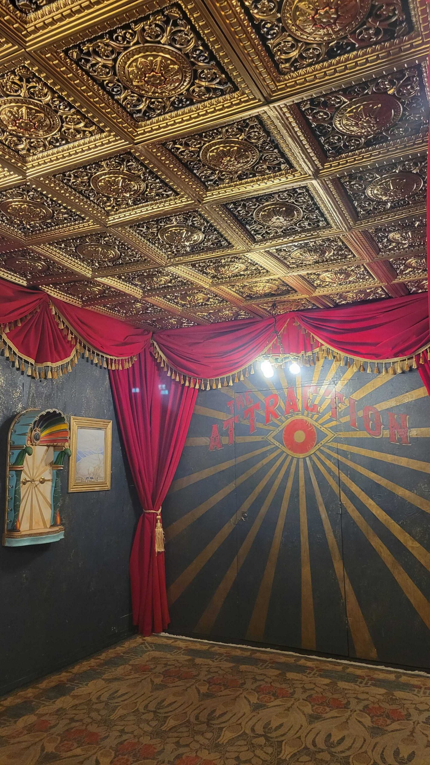 The Cage parlor configuration with ornate tin ceiling